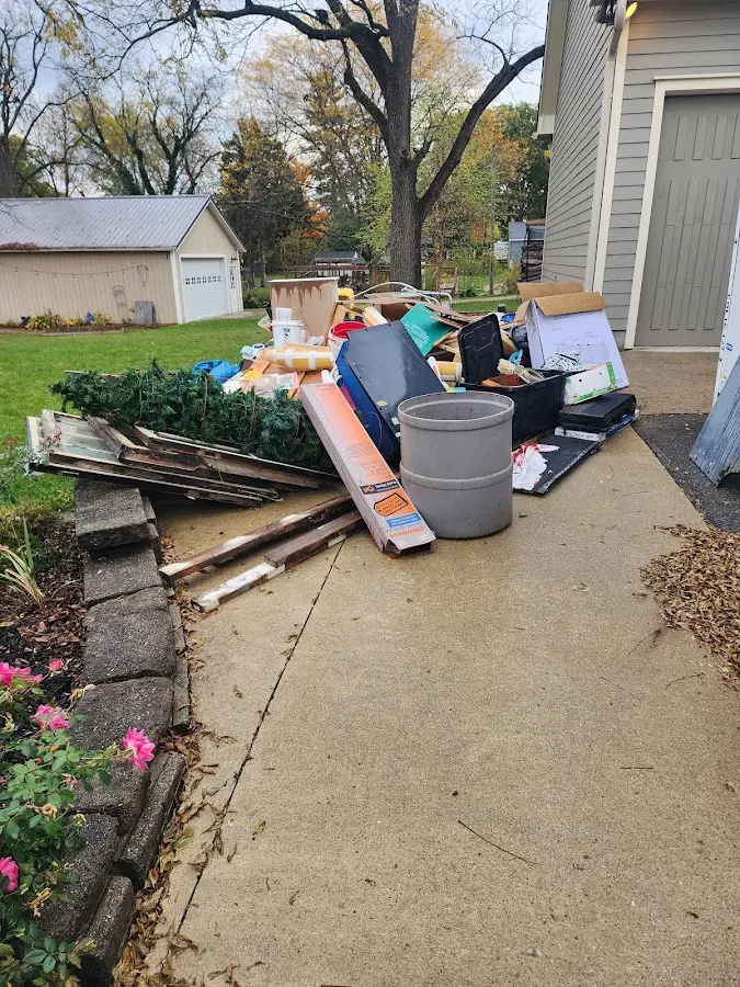 Dumpster being loaded with debris for Commercial Dumpster Rental in Hegins
